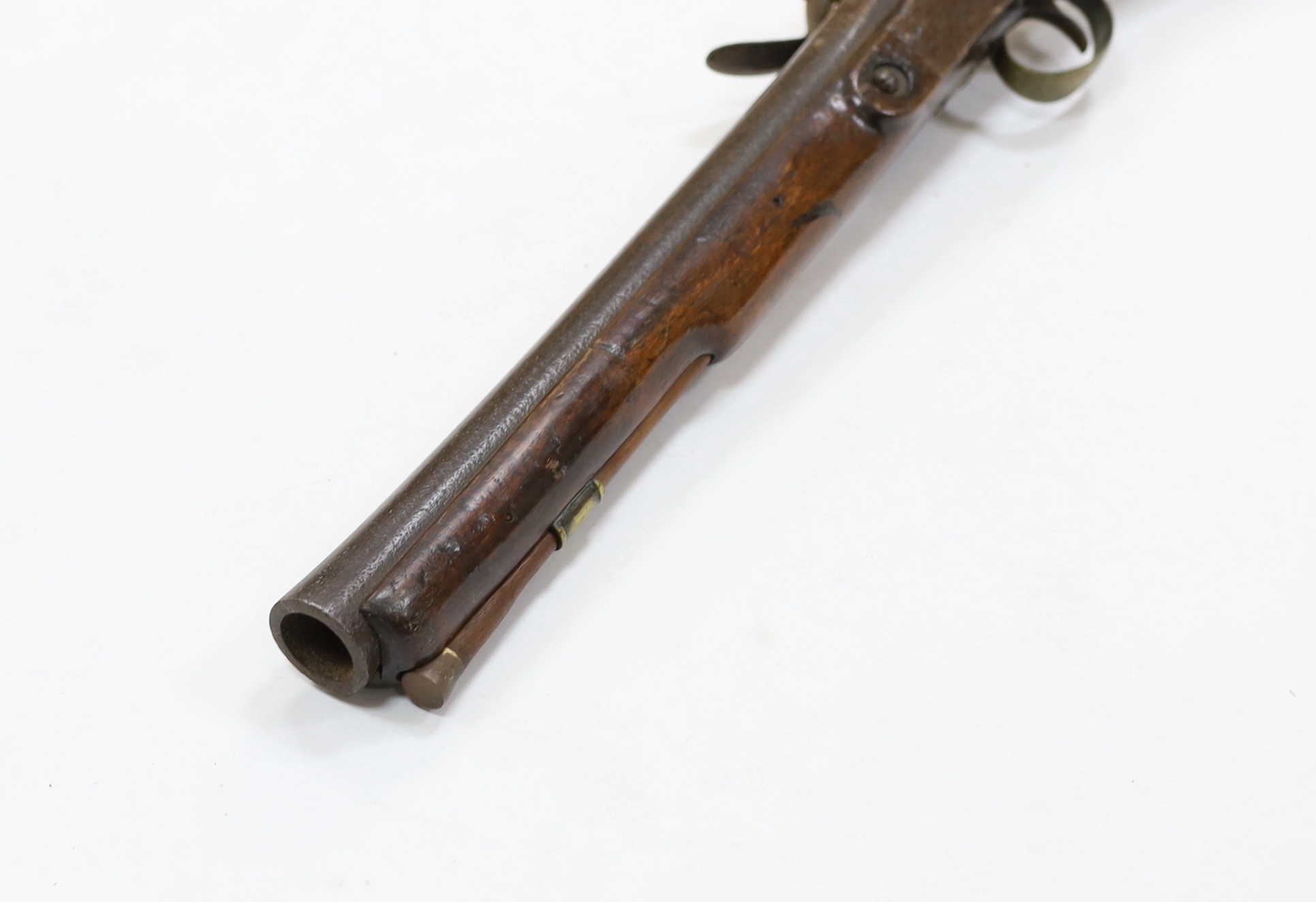 A flintlock blunderbuss fitted with a regulation British military service lock, stamped with tower and crown, GR civilian brass mounts, full stocked with wooden ramrod, barrel 36.5cm